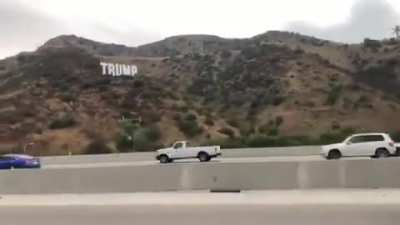 Triggered!!! Someone put up this Trump sign overnight along the 405 freeway, near the Getty. This is right in the middle of what&rsquo;s largely considered one of the most liberal cities in America.