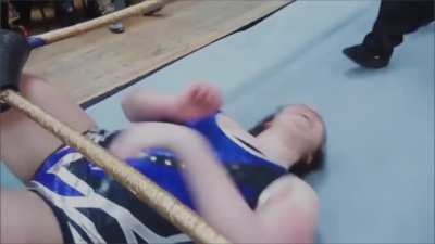 Davienne crotched by being dragged into the ringpost by Channing Thomas