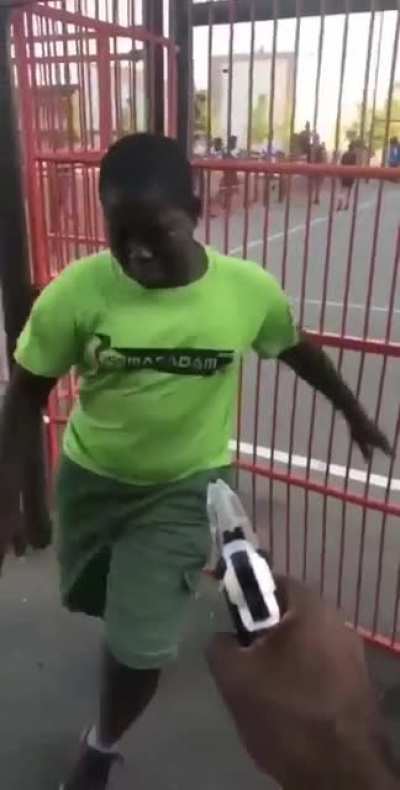 Dude forces kid to dance.