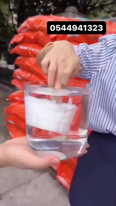 A compressed tablet towel expands when water is added: like this.