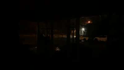 Five minutes corner with rain and thunder, handheld.