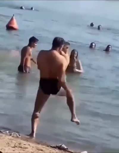 Shadow Boxing and kicking at the beach! Get 'em tiger!