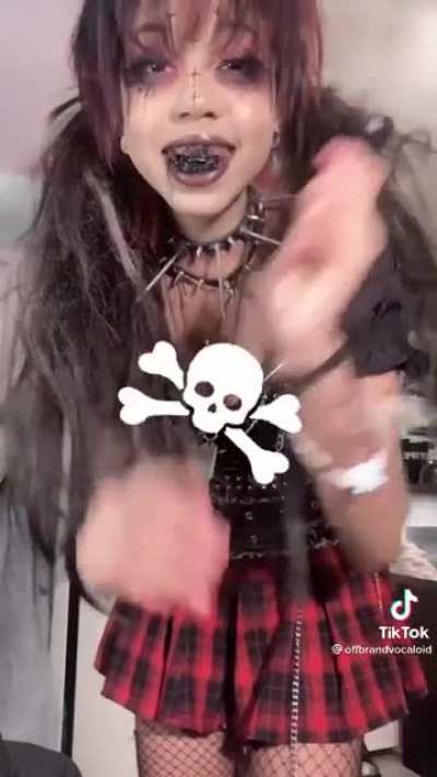 Cringy goth girl with the terrible music and oh my god what did she put on