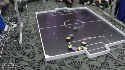 Teams of robots play 5-a-side football
