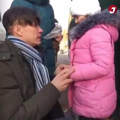 A Ukrainian father says goodbye to his family, while he stays behind to fight the Russians