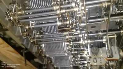 The underside of a Soviet mechanical computer while it's calculating &radic;2