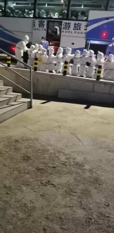 Live in Guangzhou, kids are being taken away to quarantine camp.