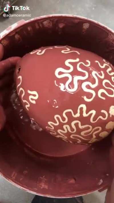 Pottery glaze doesn’t stick to parts coated with wax