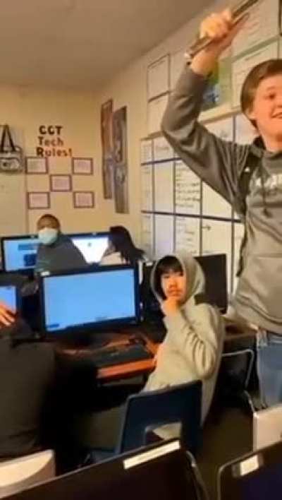 Bully smacks chair on classmate's head