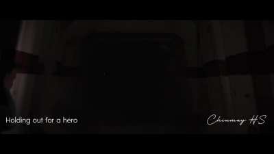 Darth Vader hallway scene but I plays "Holding Out For A Hero".