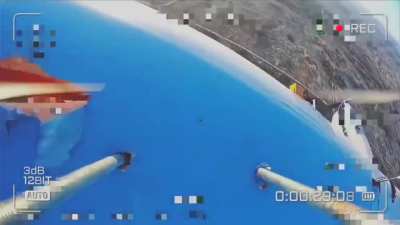 RU POV: Russian FPV drone plants an "anchor" in a Ukrainian UAV in the Kherson region.