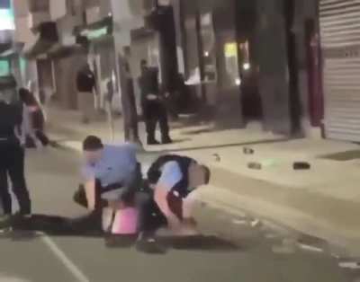 The cop literally put that man's hand on the stick just so he could have a reason to beat him up