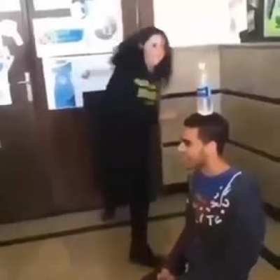 WCGW while kicking a bottle off the head.