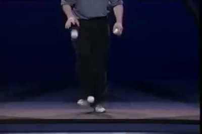 Master juggler Michael Moschen weaves rhythm, physics, and godlike hand-eye coordination into a wonderful performance called "The Triangle" (1991)