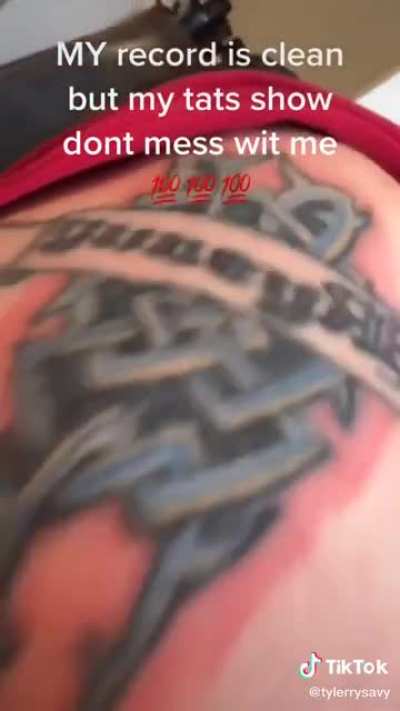 "Badass" doesn't look old enough to have tattoos