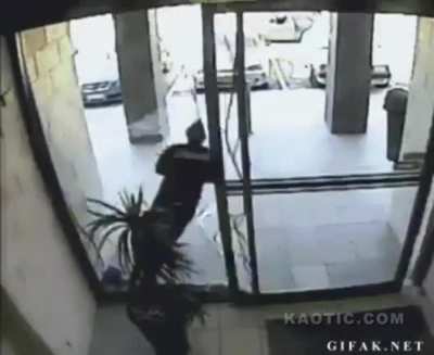 SHOPLIFTER CRASHES INTO GLASS