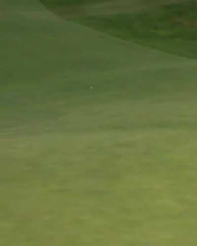 Roy McIlroy hits his own ball and uncovers a second golf ball that had been buried in the grass. (The Open Tournament, July 2025)
