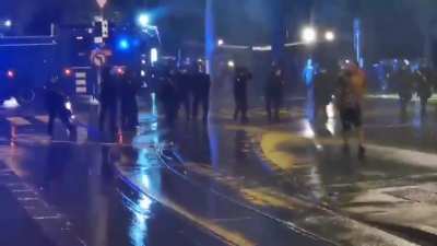 Water cannon deployed on anti "covid passport" protesters in Switzerland tonight.