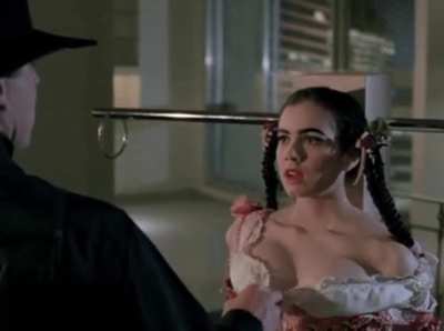 Mia Kirshner in Love and Human Remains (1993)