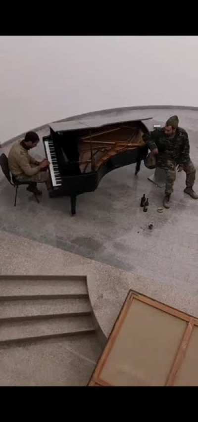 Performing "Dolya Vorovkskaya" song at Uzeyir Hajibeyov's house in Shusha.