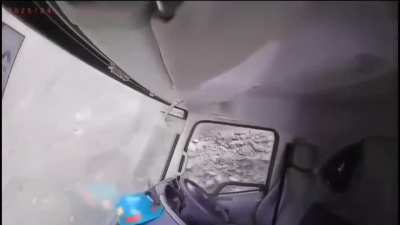 Landslide drags a bunch of machinery ,