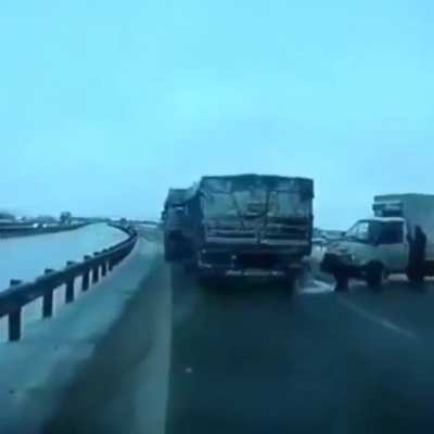 Avoiding a truck stopped in the middle of the road.