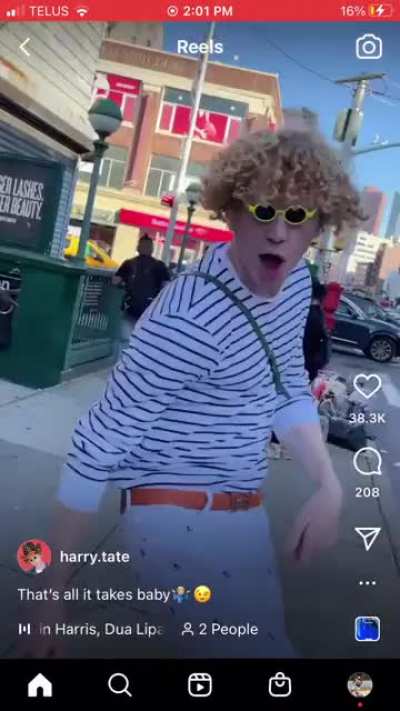 Tik tokker stands in the middle of a crowded intersection and blocks traffic to dance