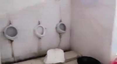 Young athletes being served food in a toilet (somewhere in INDlA)