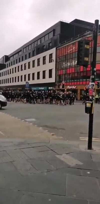Rangers fans singing 'the famine song' an anti-catholic song about the Irish famine on the streets of Glasgow today