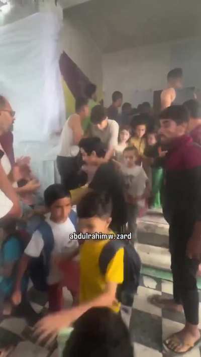 Panic at a Kindergarten after it is bombed