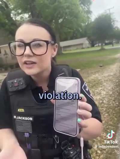 American police harass black woman for walking on the &ldquo;wrong side&rdquo; of the road in the suburbs.