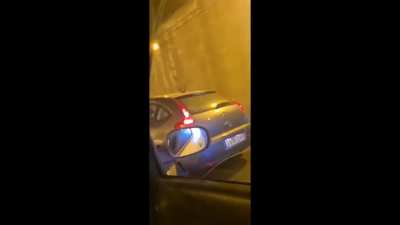 Lady complains to driver that he brake too fast, starts a high-speed chase and crashes with her 12-year-old son in the car