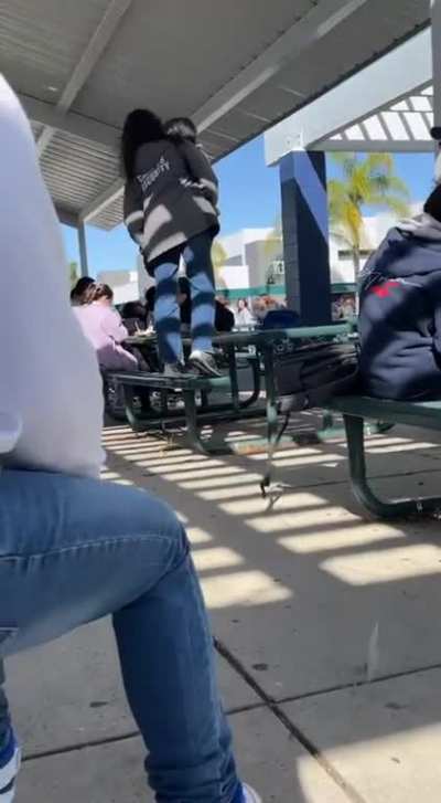 Kid at my school rambling on a table