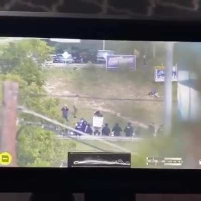 Police shoot a peaceful 16 year old protester in the head (NSFW)