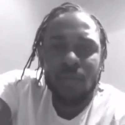 Kendrick Lamar when a homeless man with a semi-tan complexion asks for money.