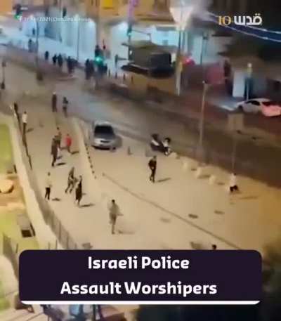 Palestinians running as occupation forces chase them while throwing stun grenades. Yesterday, Palestinians in Jerusalem gathered to protest the occupation days after Israel celebrated its creation.