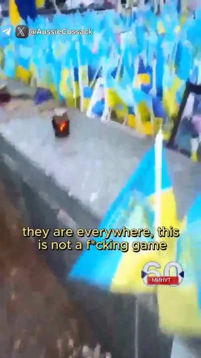 UA POV: 'Look, you Banderites! Ready to lie down next to them?' &ndash; a Kiev resident shows a flag memorial in Kiev, complains about Banderites 