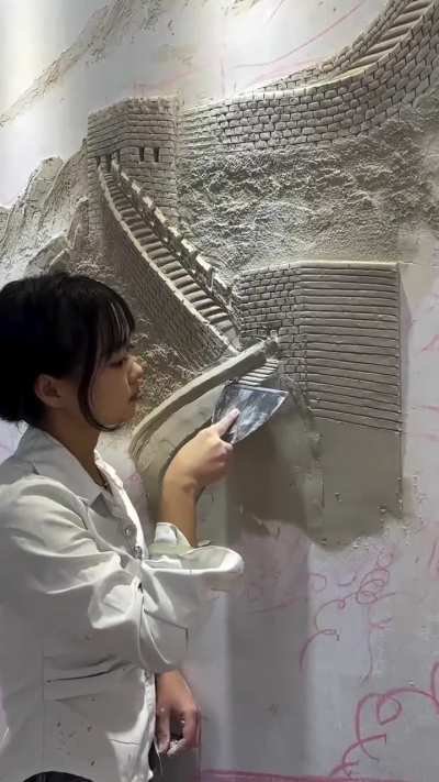Daidai is a Chinese mural artist who turns plain walls into sculptural landscapes