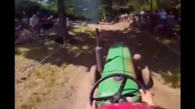 Man pushes his tractor to the limit