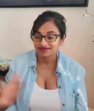 Deep teasing us with her tight tank top barely covering her massive tits 