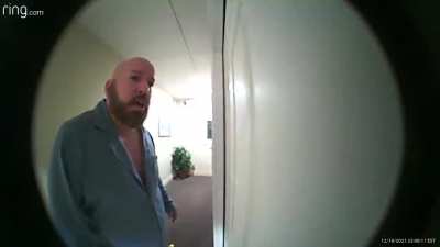 Bald Man in pajamas with missing teeth and fake eyelashes pounding on a door at 11PM