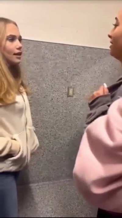 brunette confronts blonde for allegedly hitting on her boyfriend, then knocks out blonde with a sucker punch to the face