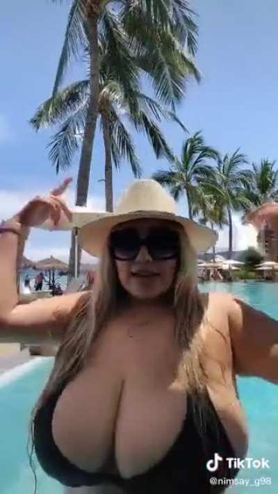 Busty poolside