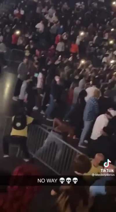 Man tries to jump the fence at the concert and get completely denied