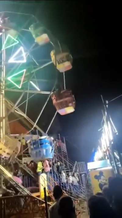 Riders fall out of malfunctioning Ferris Wheel