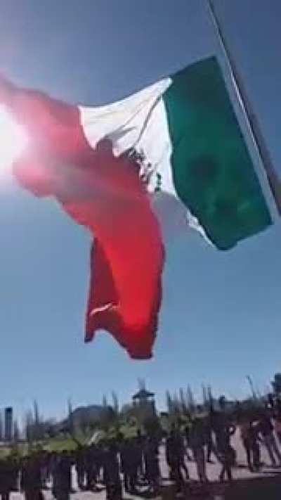 Soldier got entangled in a gigantic flag