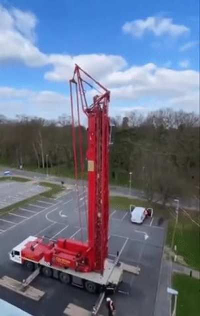 Crane folds back into truck