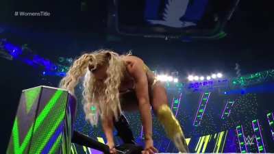 Charlotte goes for a moonsault, but Bliss rolls out of the way. Flair lands on her feet and hits a standing moonsault for a near fall. I love the expression of pain on Alexa&rsquo;s face!