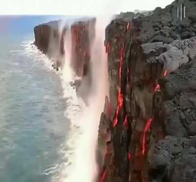 Sea water evaporating from lava resembles a reverse waterfall