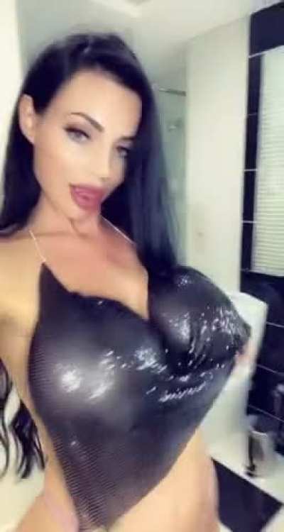 Yvonne Bar "subtly" hiding her big tits
